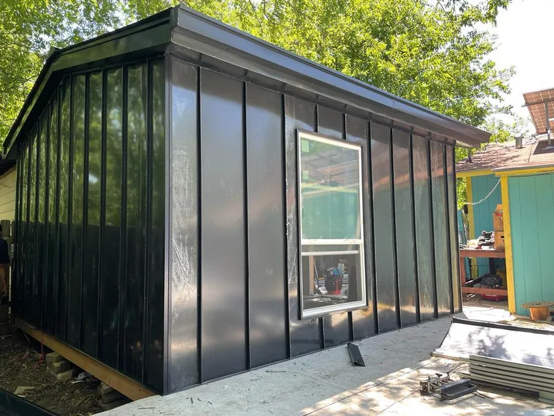 Black standing seam metal wall panels for Metal Roof Installation in Littlefield