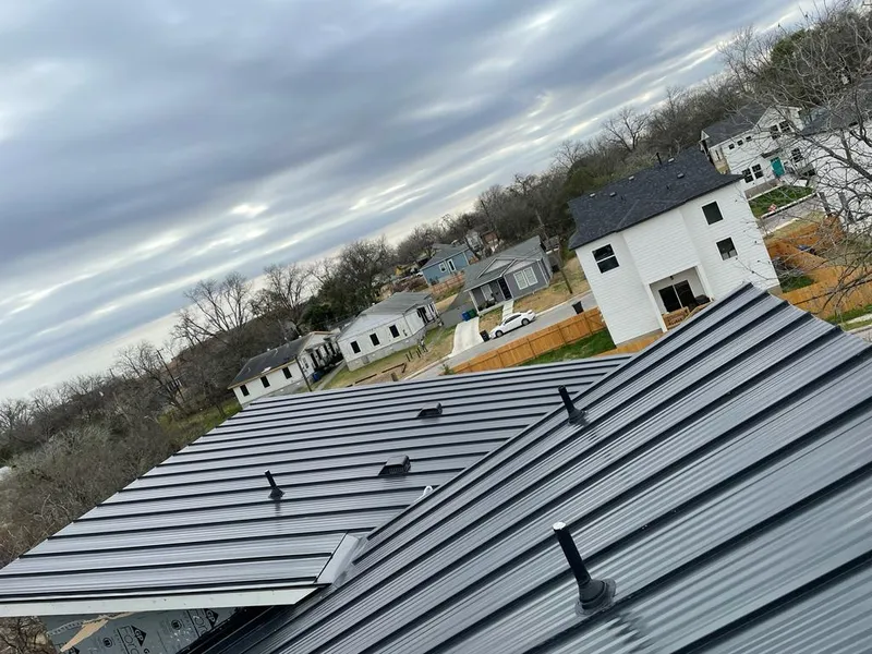 Standing seam metal roof panels with vents for Skylight Repair in Littlefield